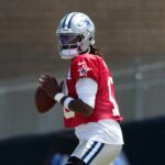Joe Milton's Helmet Clash: Is His Thumb Injury More Serious Than It Seems?