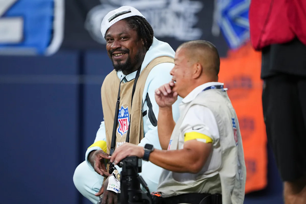 Marshawn Lynch’s Unbelievable Move to Shield Camera Sparks Questions About What Really Went Down During George Holani’s Debut