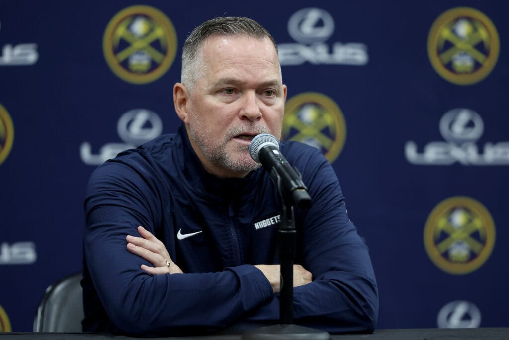 "Behind Closed Doors: Did a Nuggets Star Secretly Celebrate Michael Malone's Shocking Firing?"