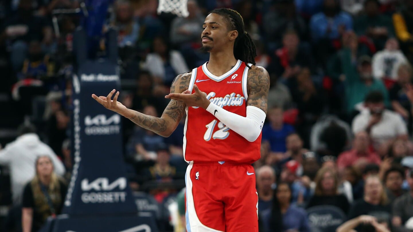 "NBA Stars Walk a Fine Line: Morant and Hield Avoid Penalties Despite Controversial Finger Gun Gesture—What’s Behind the League's Decision?"