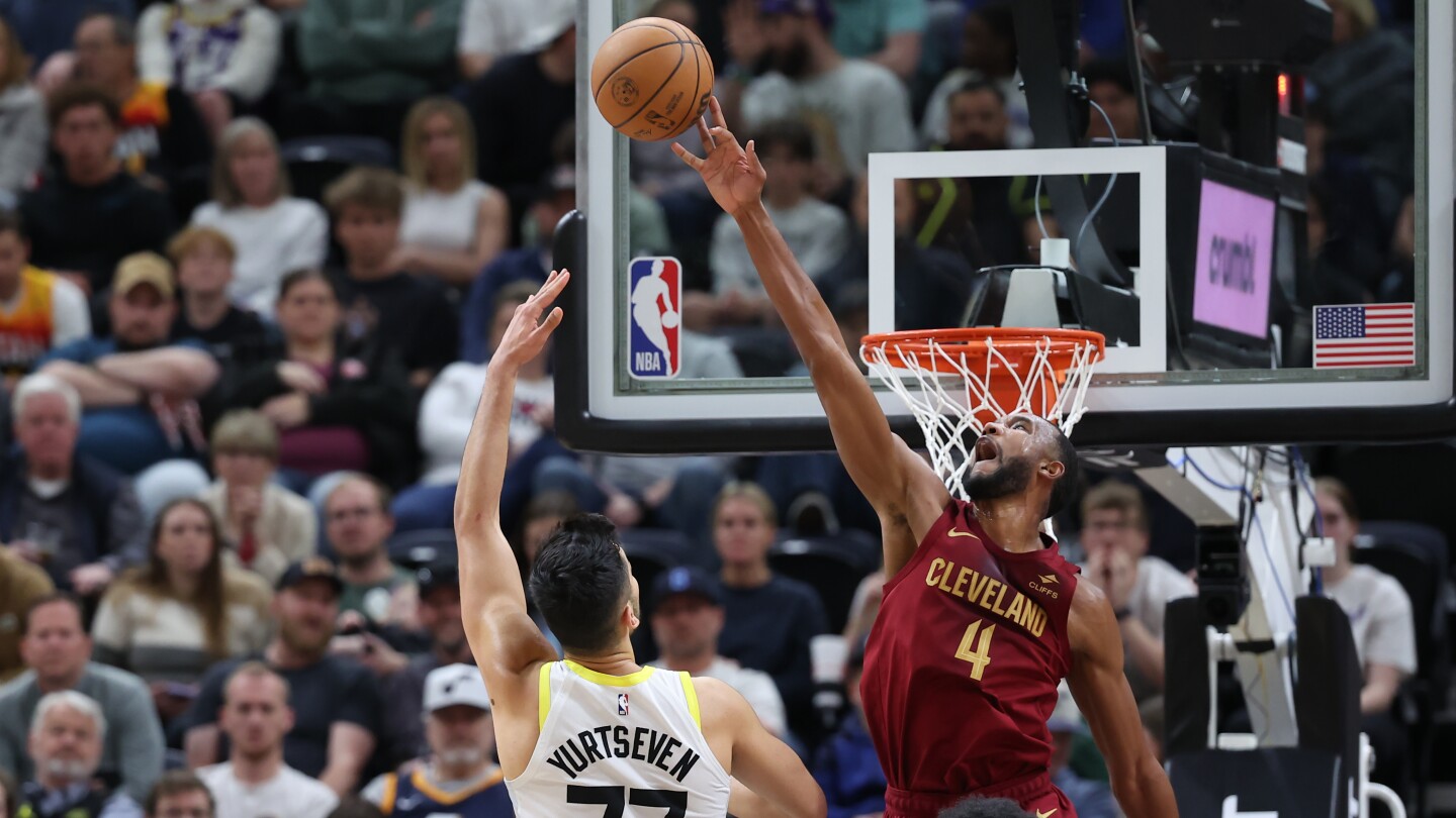 "Rising Star Evan Mobley Clinches NBA's Top Defensive Honor: What's His Secret?"