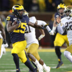 Michigan and Notre Dame Face Off in High-Stakes Battle for Elite 4-Star Defensive Lineman!