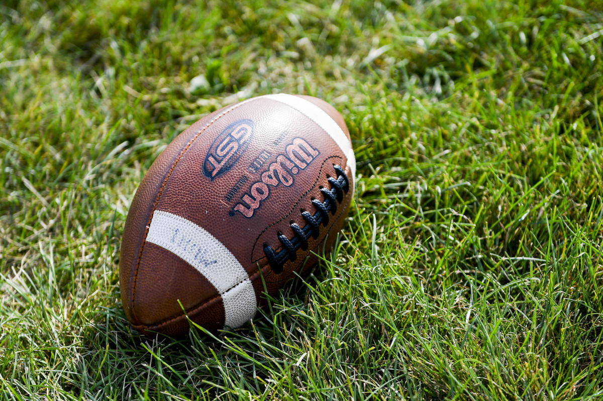 Beloved Football Coach's Sudden Death at 47 Sparks Outpouring of Prayers and Unanswered Questions