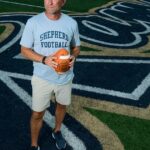 From Life-Threatening Battle to the Sidelines: How Rob Ambrose Defied Cancer to Lead Shepherd Football to Glory
