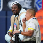 Marshawn Lynch’s Unbelievable Move to Shield Camera Sparks Questions About What Really Went Down During George Holani’s Debut