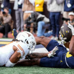 Michigan Football Star Stuns Fans with Unbelievable One-Handed Catch—You Won't Believe How He Pulled It Off!