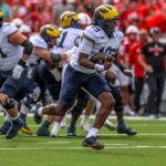 Damon Payne Reveals Surprising Truth About Work Ethic at Michigan vs. Alabama—You Won't Believe What He Said!