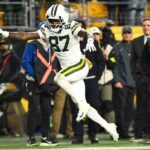 Romeo Doubs Unveils Mysterious New Packers Gear—What’s Hidden Beneath the Guardian Cap?