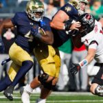 Underdog Showdown: Can No. 20 USC Upset No. 13 Notre Dame in a Battle of Titans?