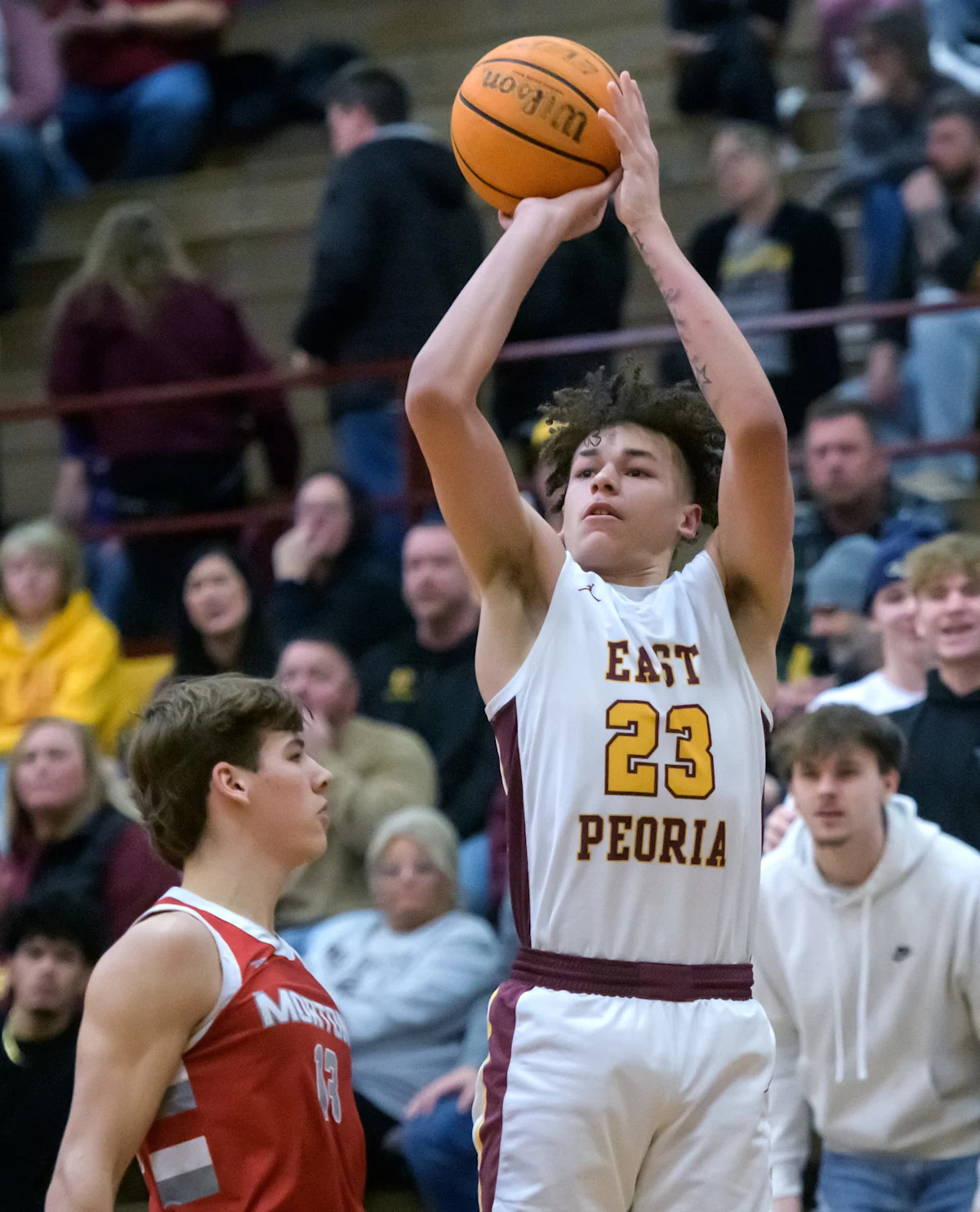 East Peoria All-Stater's Unexpected Big Ten Commitment Sends Shockwaves Through College Basketball!