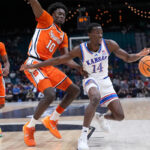 Tre White and Flory Bidunga's Double-Doubles Ignite Kansas' Stunning Triumph Over Syracuse at Players Era Tourney