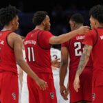 Wolfpack's Journey to the Big Dance: What Secrets Are Behind Their Fierce Drive?