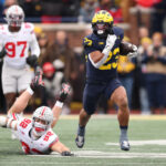 Michigan's Secret Weapon: Which 2 Top Recruits Are Seriously Considering a Surprise Commitment?