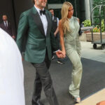 Kelly Stafford’s Dazzling Green Dress at Kelce-Swift Wedding Sparks Fashion Frenzy—See Why Everyone’s Talking!