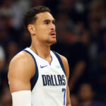 Dwight Powell Set to Defy Odds and Join Dallas Mavericks Training Camp Amid Unexpected Roster Clash