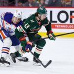 NHL Rumors Heat Up: Could Quinn Hughes' Standoff with the Minnesota Wild Spark a Shocking Twist?